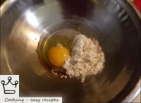 Beat the egg and, gradually adding flour and water...