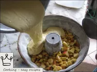 Pour the apples with dough. ...
