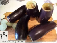 Carefully cut the middle out of whole aubergines, ...