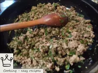 Add finely chopped greens to the cooled mince. Sal...