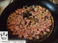 Fry finely chopped speck and ham in fat over a med...