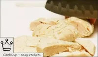 Cut boiled chicken meat into small pieces. ...