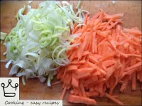 Carrots are peeled, washed, cut into strips. Onion...