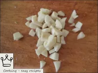 Peel the garlic, cut into cubes. ...