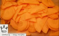 Peel the carrots, wash, cut into wedges or thin ha...