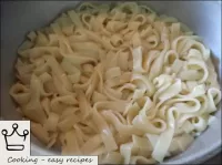 Put the finished noodles in a colander. ...