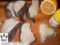 Drizzle the fish with lemon juice, grate with salt...