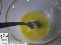 Beat the chicken egg with a fork. ...