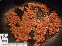 Heat the pan with vegetable oil. Put carrots in ho...