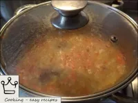 Cover the pan with a lid and cook the vegetables o...