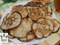 So bake all the semolina pancakes, adding oil to t...