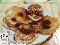 Serve the semolina fritters hot with jam, butter o...
