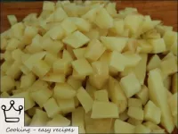 Peel the potatoes, wash, cut into small cubes. ...