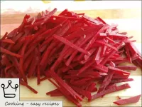 Peel the beets, wash, cut into strips. ...