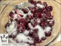 Pour cherry berries with sugar sand. ...