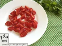Cut cherry tomatoes into quarters, too. ...