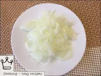 Peel the onions and cut into quarters of rings. ...