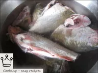 To make ear carp fish, clean the fish, gut, remove...