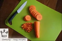 Wash the carrots, peel them, cut into 0. 5-1 cm cu...