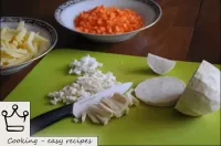 Wash the parsley root and celery root, peel and th...