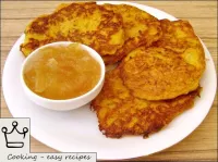 Potato and pumpkin fritters are served with apple,...