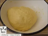 Dough is kneaded, ball is rolled out of it. ...