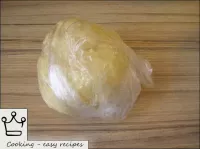 Wrap in paper and place the yeast-free pizza dough...