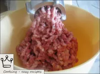 Grind the meat in a meat grinder or chop very fine...