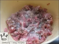 Add salt and pepper to the minced meat. ...