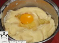 Then, stirring, eggs are added one at a time. ...