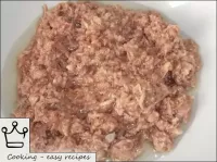 How to make canned tuna salad: Remove the fish fro...