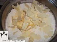 Ajouter des morceaux de beurre froid et frotter to...