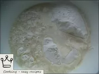 Add vegetable oil (or beaten eggs) to the flour, a...