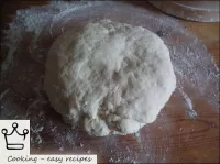 Put the dough on the cutting board, pouring flour ...