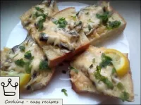 Hot sandwiches with sprats or sardines and cheese...