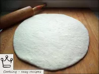 From the finished dough, a cake 1-2 cm thick is ro...