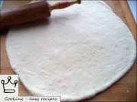 The dough is ready. You can roll out and form a pi...