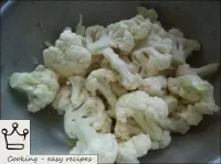 Cómo preparar la coliflor en una mordaza: Lavar la...